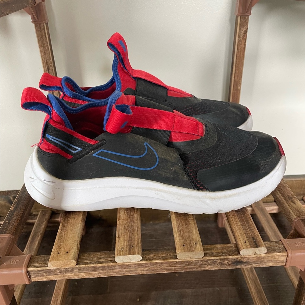 Nike Black and Red Sneakers with Slip-On Design